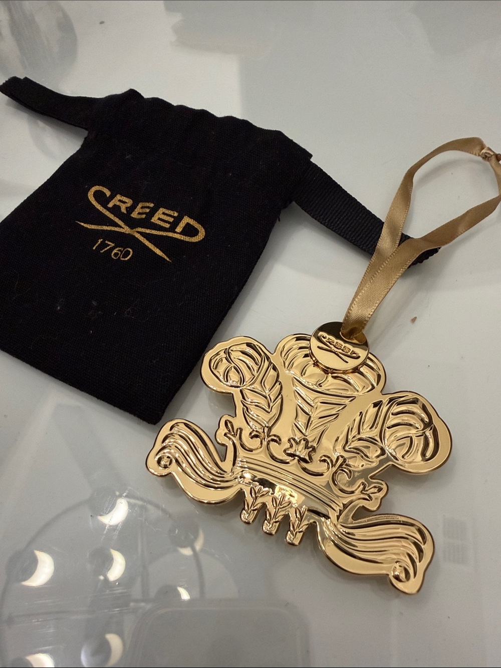 Creed Gold Crest Ornament with Satin Ribbon